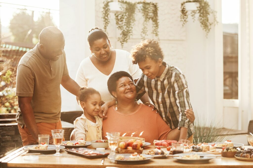 Happy Grandmother Celebrating Birthday with Family