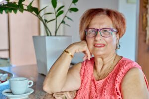 Portrait of senior smiling woman of 70s years old